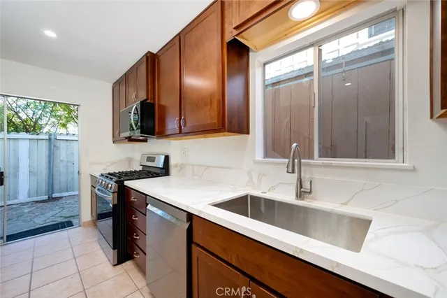 a kitchen with a stove and a microwave