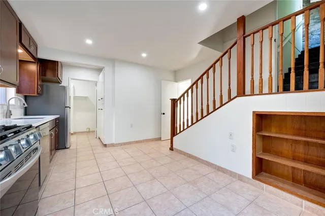 a view of entryway with window and stairs