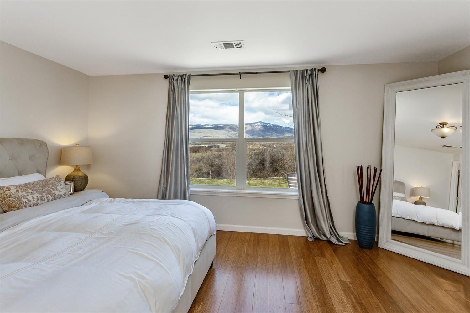 942 Spring Way Ashland, OR 97520 - Photo 17 of 35 Primary bedroom with views east over Hamilton riparian zone.