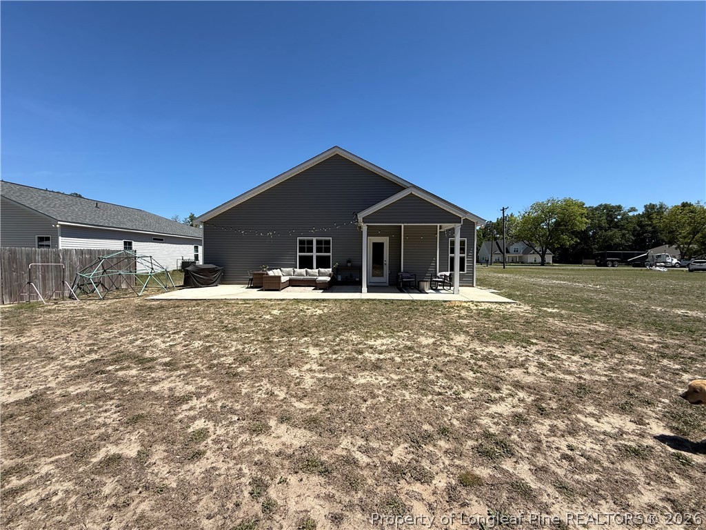 7720 Rufus Johnson Road Fayetteville, NC 28306 - Photo 50 of 50 a front view of a house with a yard