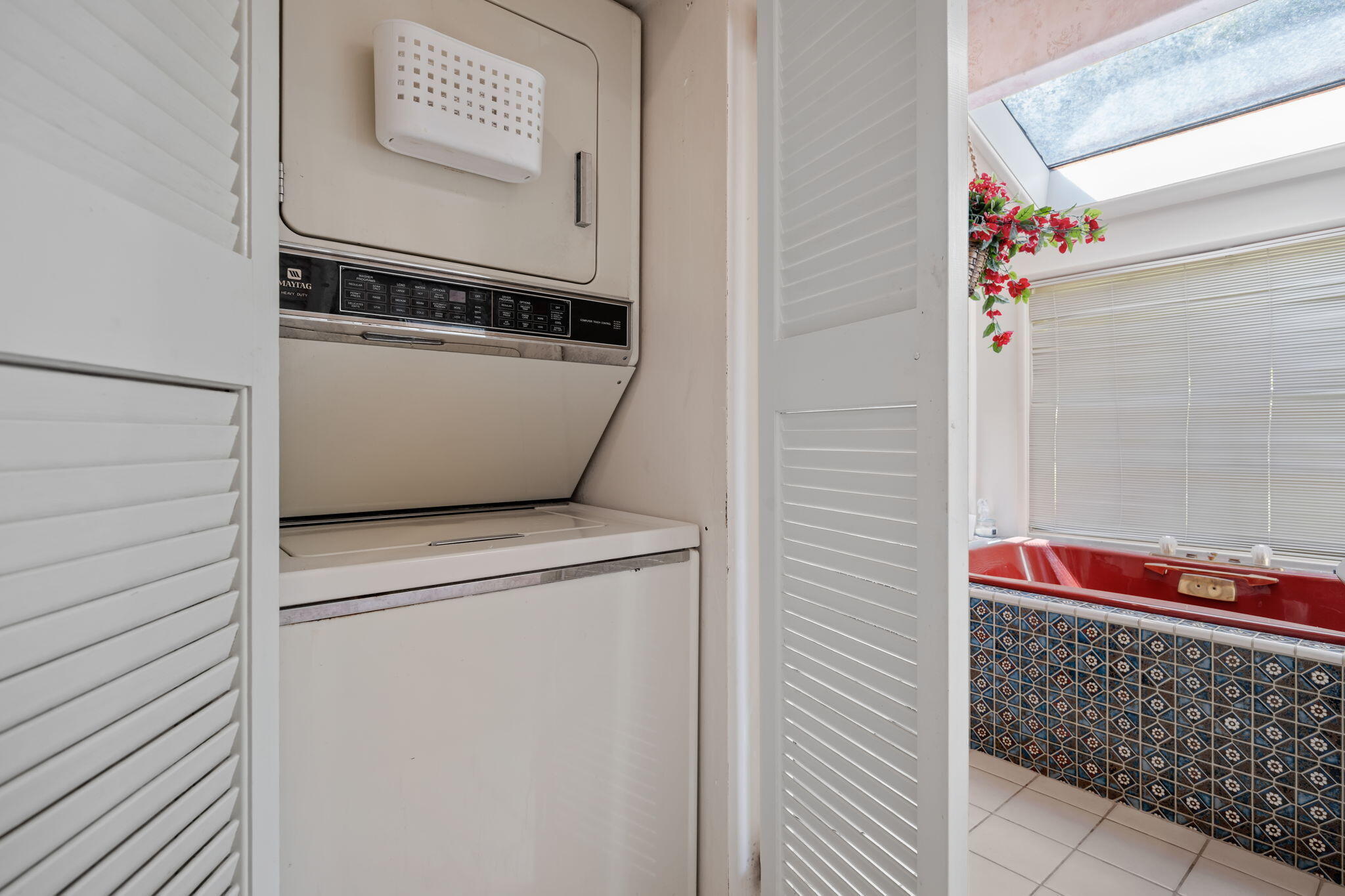 1712 Lasuen Road Santa Barbara, CA 93103 - Photo 19 of 36 a utility room with dryer and washer