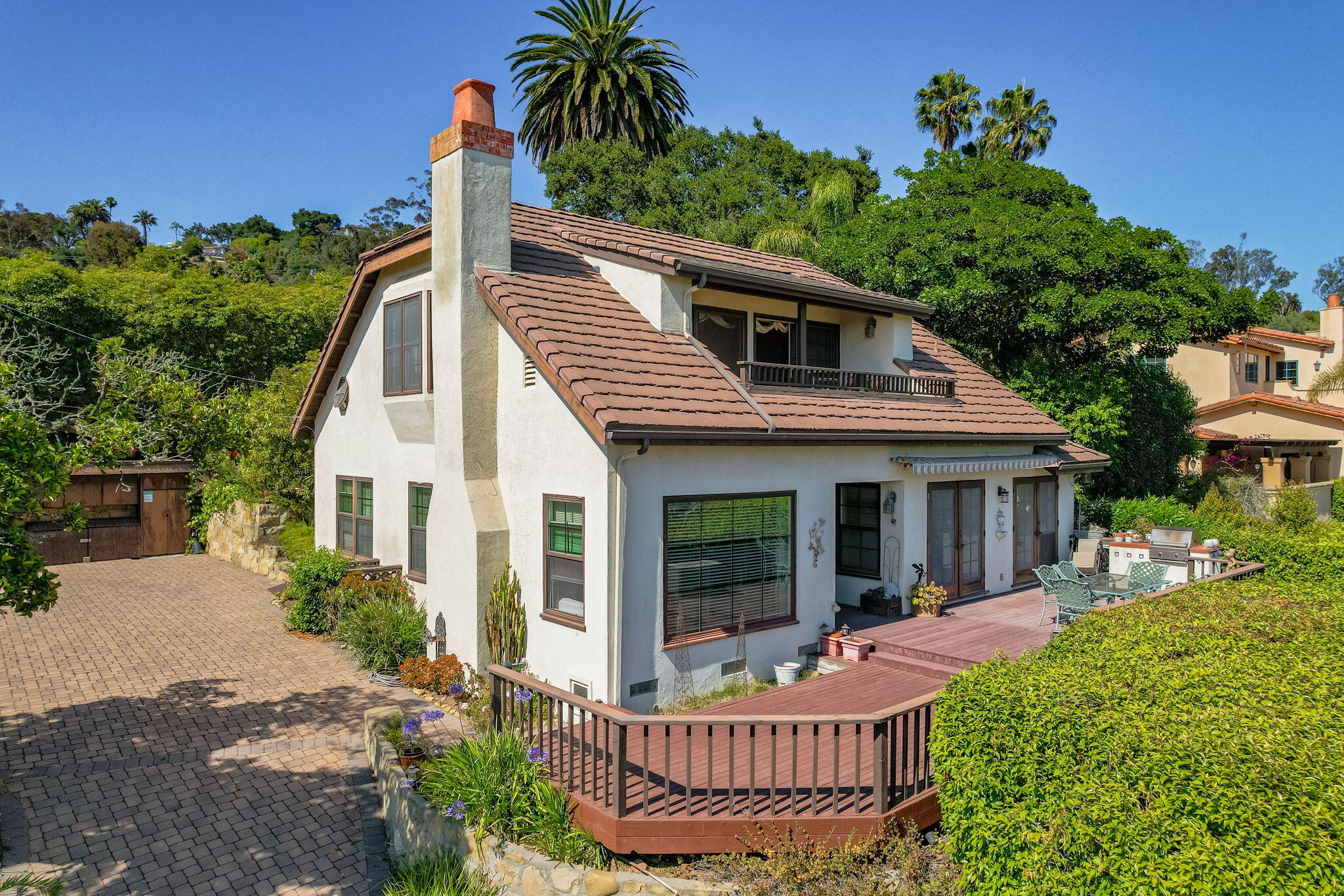 1712 Lasuen Road Santa Barbara, CA 93103 - Photo 2 of 36 a front view of a house with porch