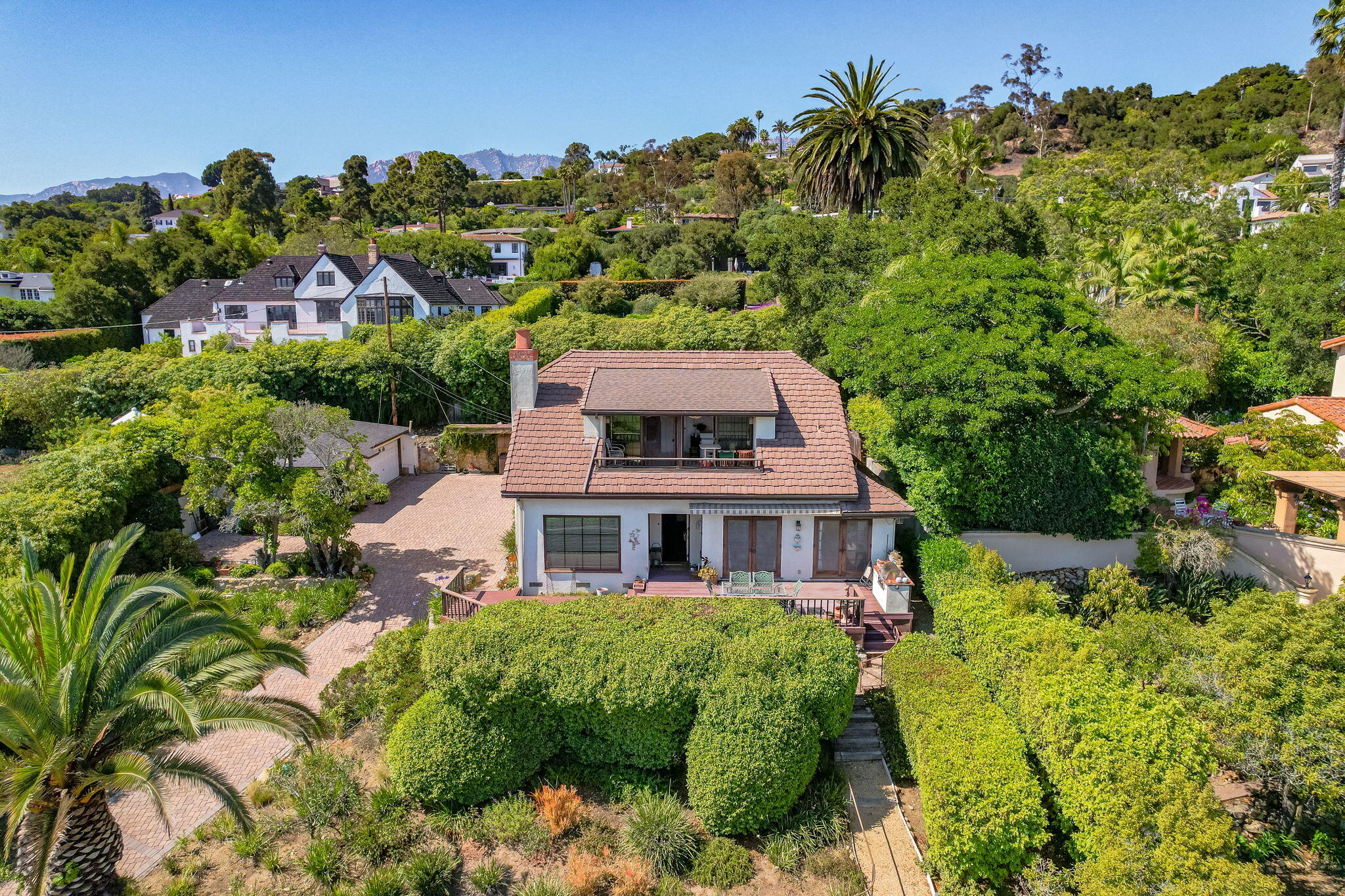 1712 Lasuen Road Santa Barbara, CA 93103 - Photo 28 of 36 a aerial view of a house with a garden