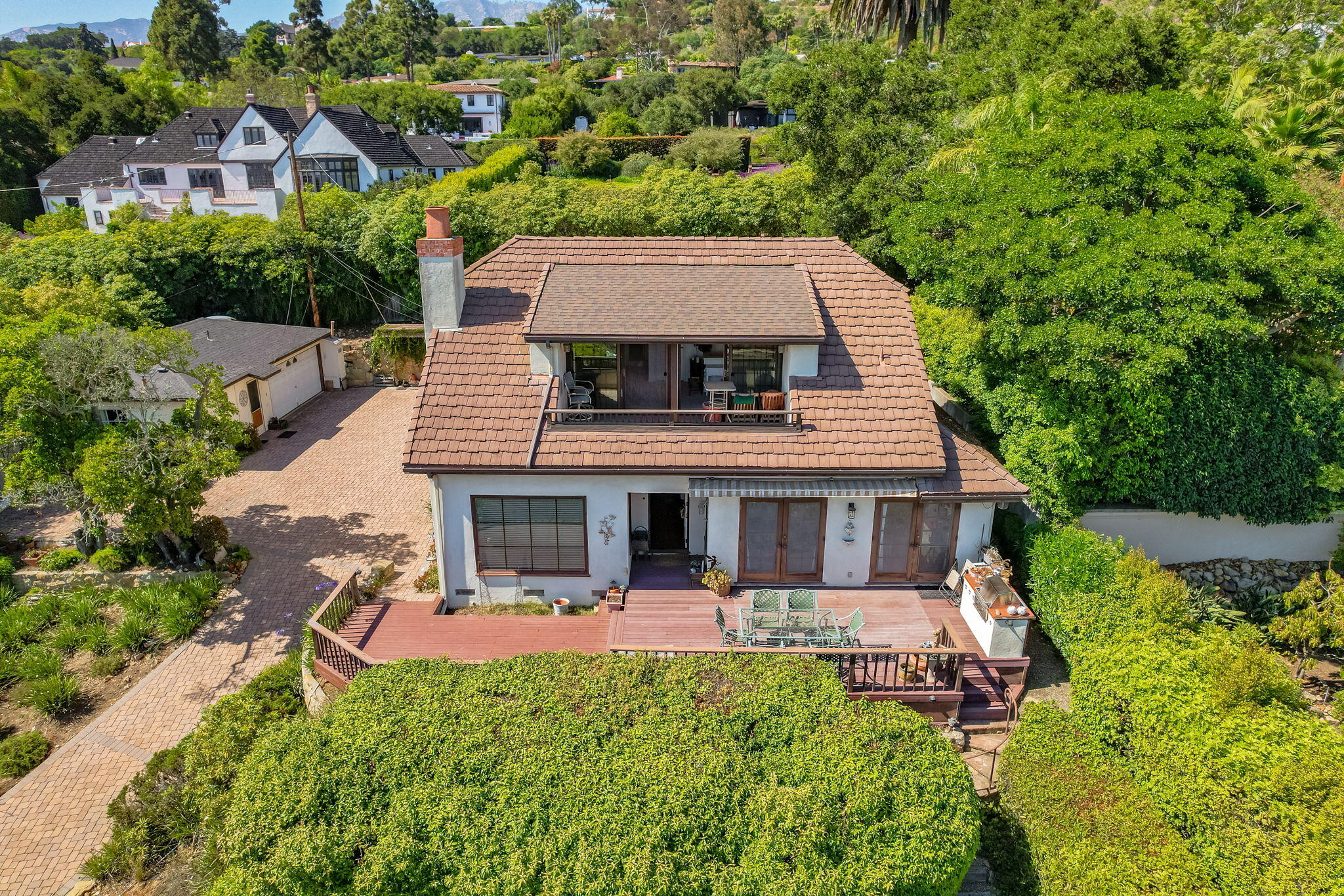 1712 Lasuen Road Santa Barbara, CA 93103 - Photo 29 of 36 aerial view of a house with swimming pool and garden