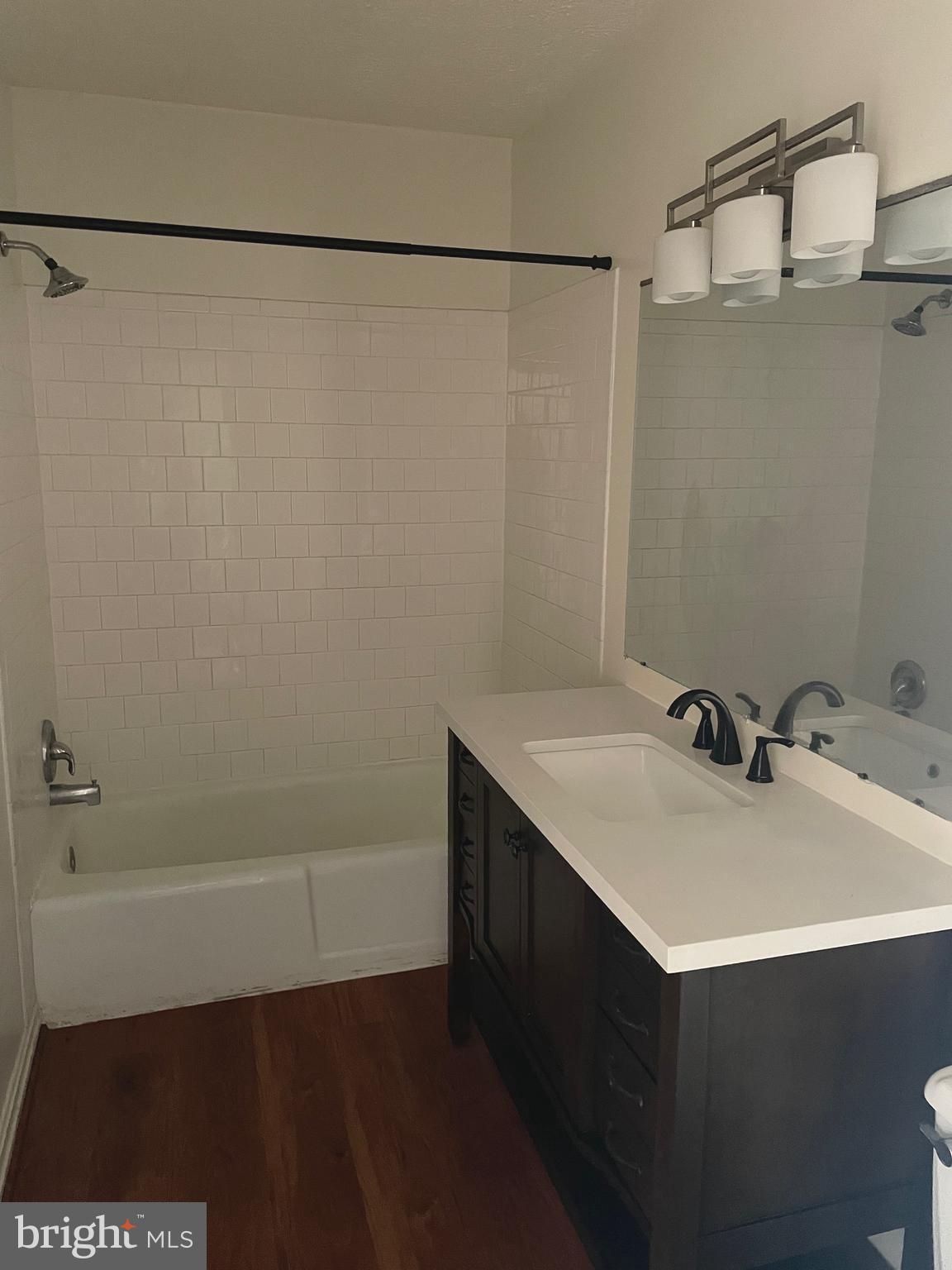 10177 Irongate Way Manassas, VA 20109 - Photo 10 of 25 a bathroom with a sink and a mirror
