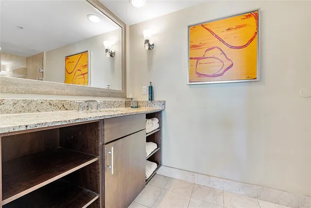 a bathroom with a shower and toilet