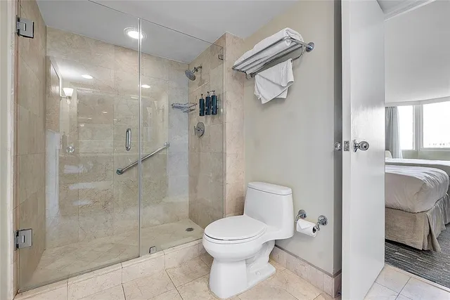 a kitchen with stainless steel appliances granite countertop a sink and a microwave