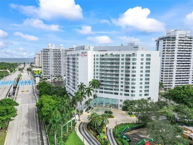 a view of a city with tall buildings
