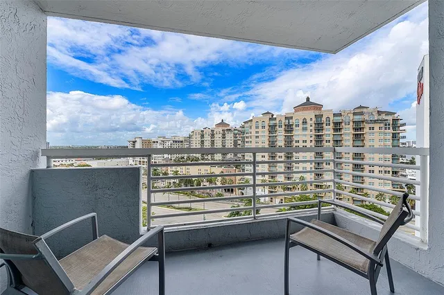 a bedroom with a bed and a lamp