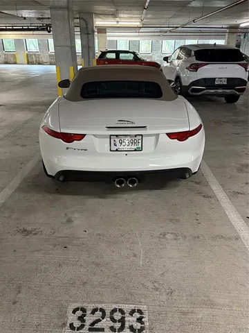 a swimming pool with outdoor seating and yard