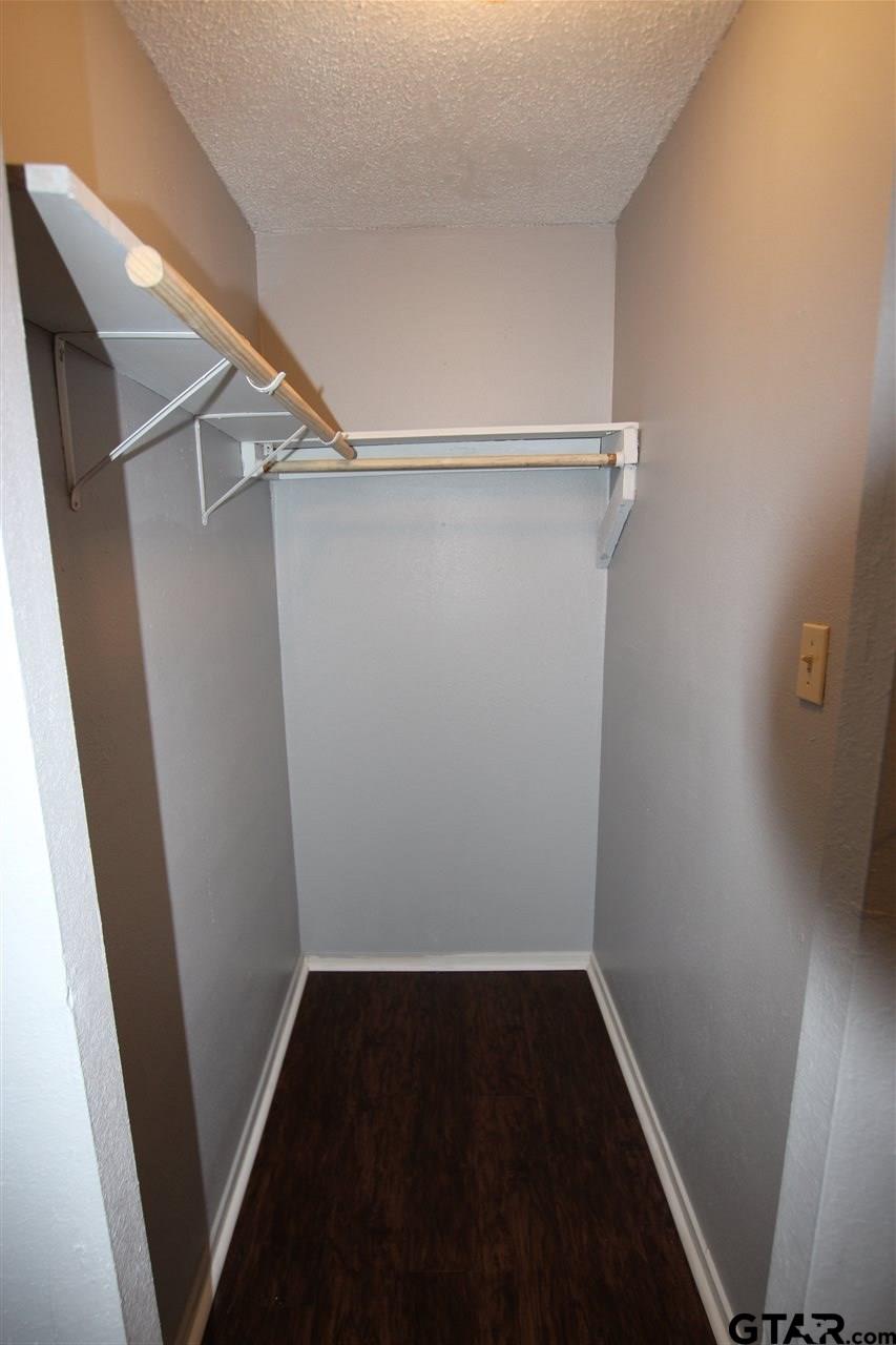 4229 Old Chandler Road, Unit B Tyler, TX 75702 - Photo 12 of 17 a view of an empty walk in closet