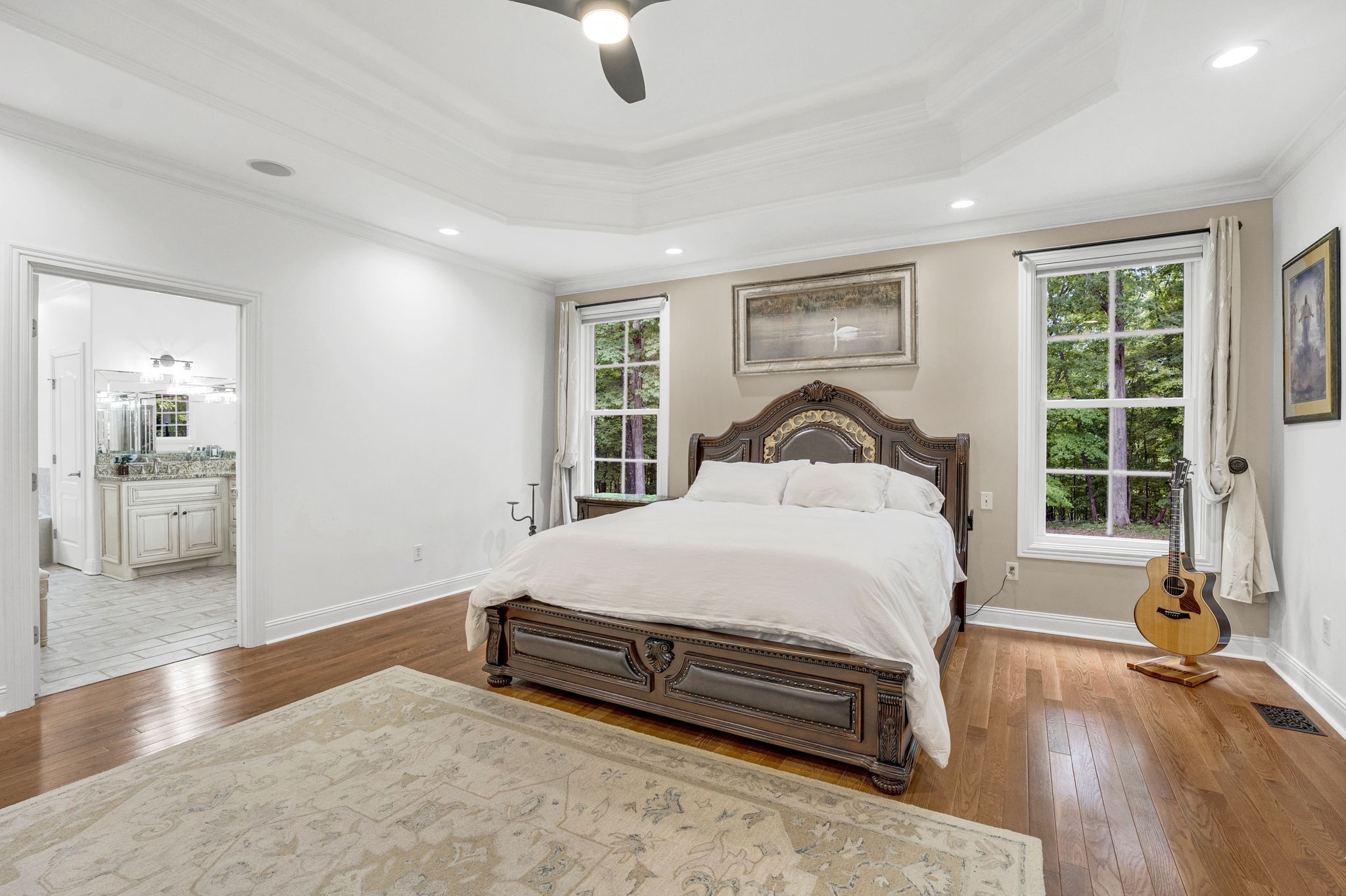 6948 Whispering Oaks Drive Springfield, TN 37172 - Photo 11 of 16 a bedroom with a bed and wooden floor