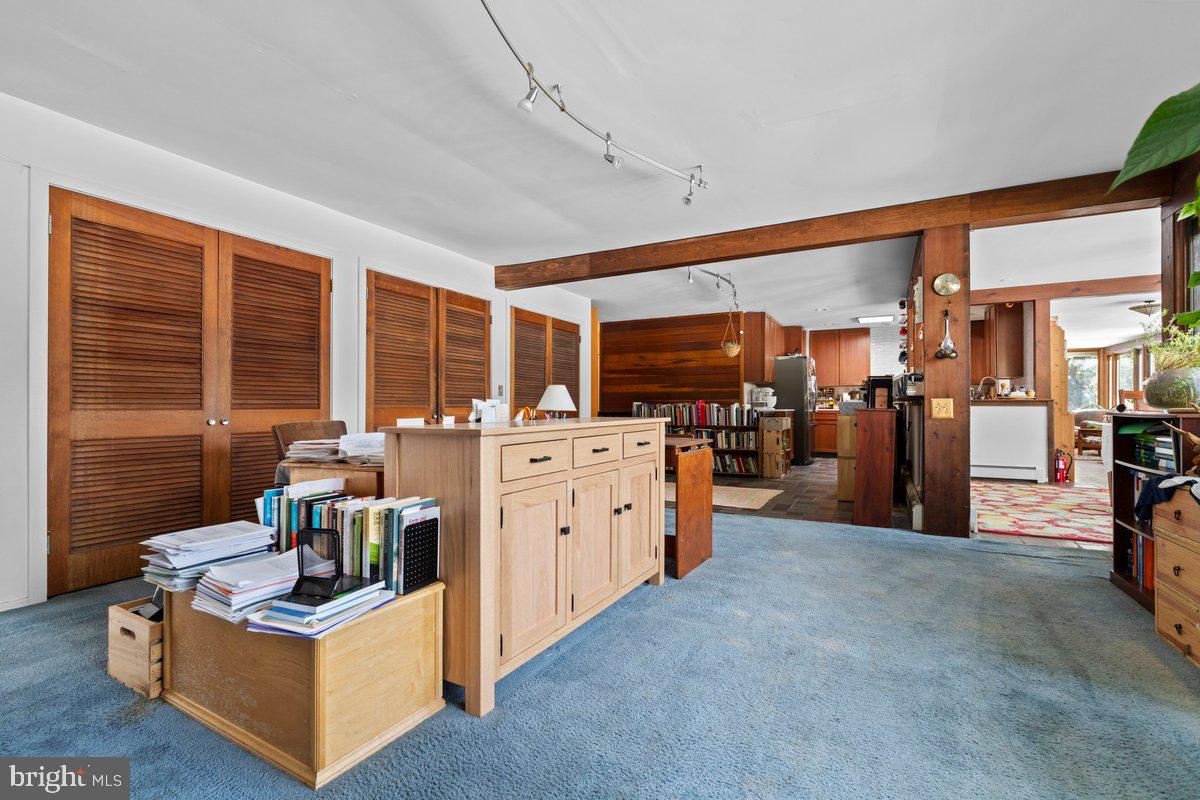 1112 General Saint Claire Road Washington Crossing, PA 18977 - Photo 13 of 34 a living room with furniture and a large window