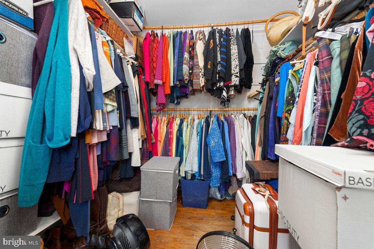 1112 General Saint Claire Road Washington Crossing, PA 18977 - Photo 23 of 34 a view of walk in closet with clothes and shoes