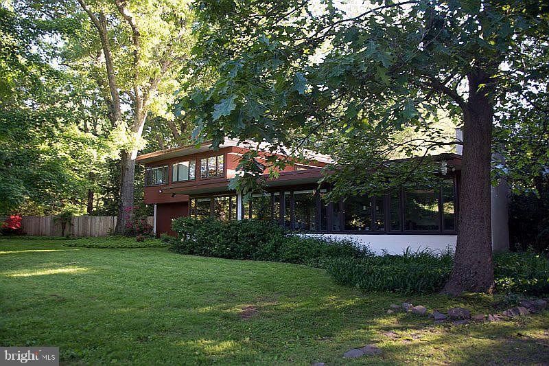 1112 General Saint Claire Road Washington Crossing, PA 18977 - Photo 5 of 34 a house view with swimming pool and garden