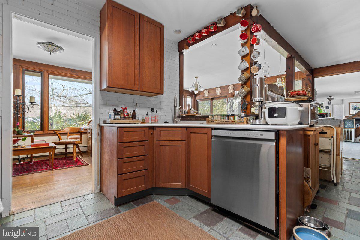 1112 General Saint Claire Road Washington Crossing, PA 18977 - Photo 10 of 34 a kitchen with a sink cabinets and appliances