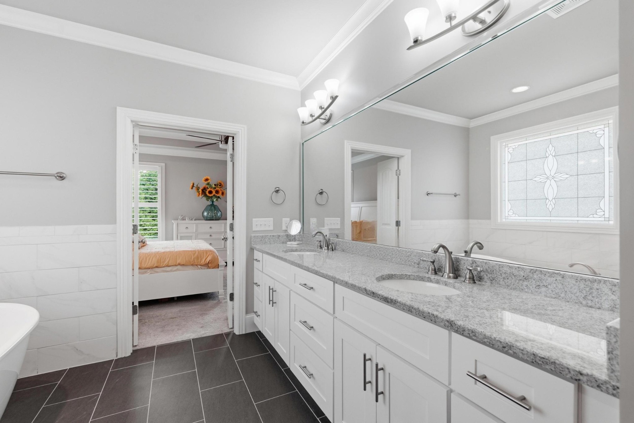 6000 Wallaby Court Spring Hill, TN 37174 - Photo 25 of 57 a en suite bathroom with a double sink and mirror