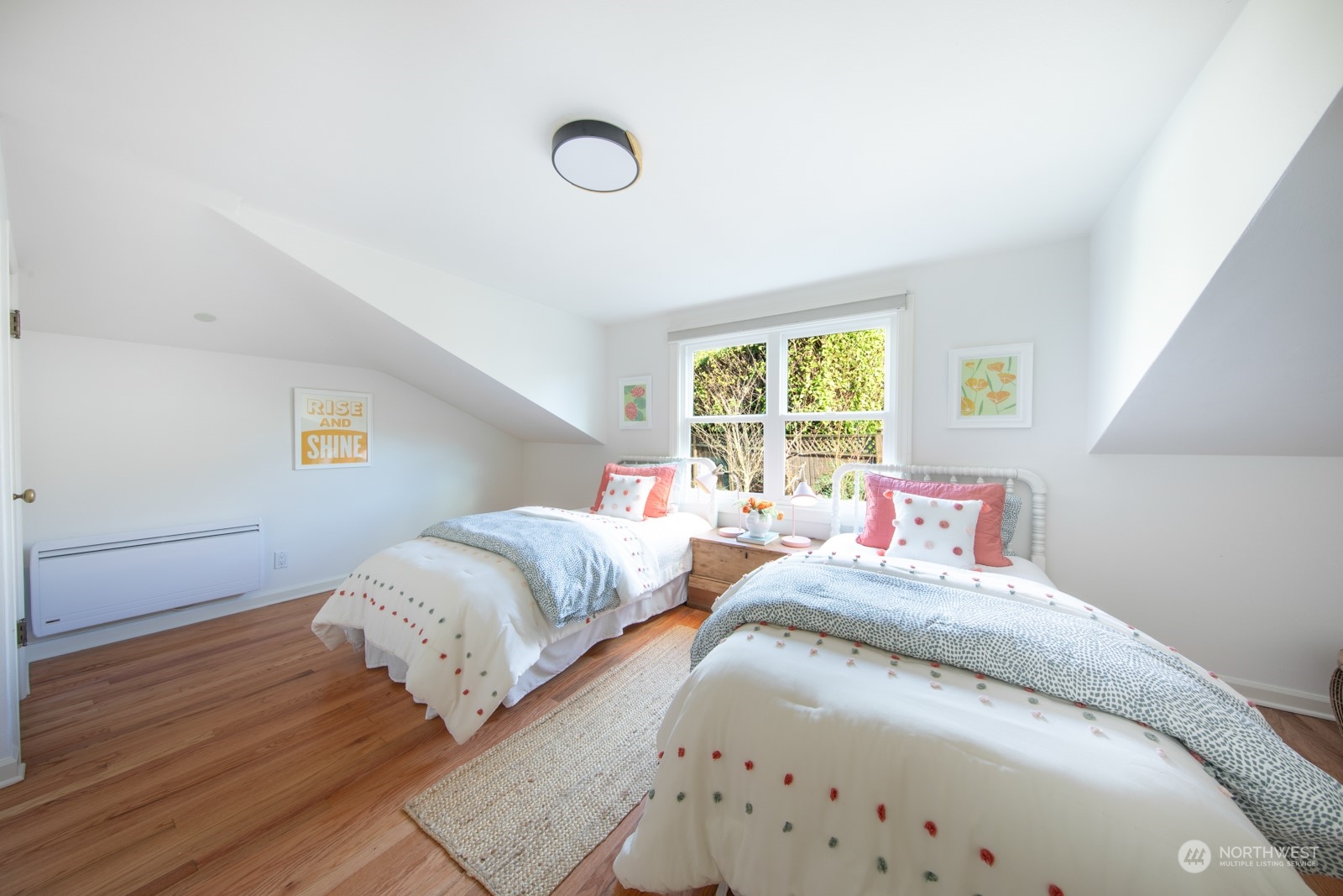 1821 North 80th Street Seattle, WA 98103 - Photo 11 of 30 a bedroom with double bed and a window