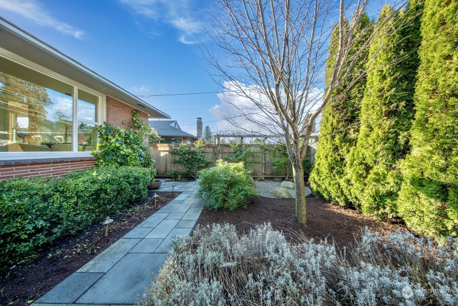 1821 North 80th Street Seattle, WA 98103 - Photo 19 of 30 a view of a back yard
