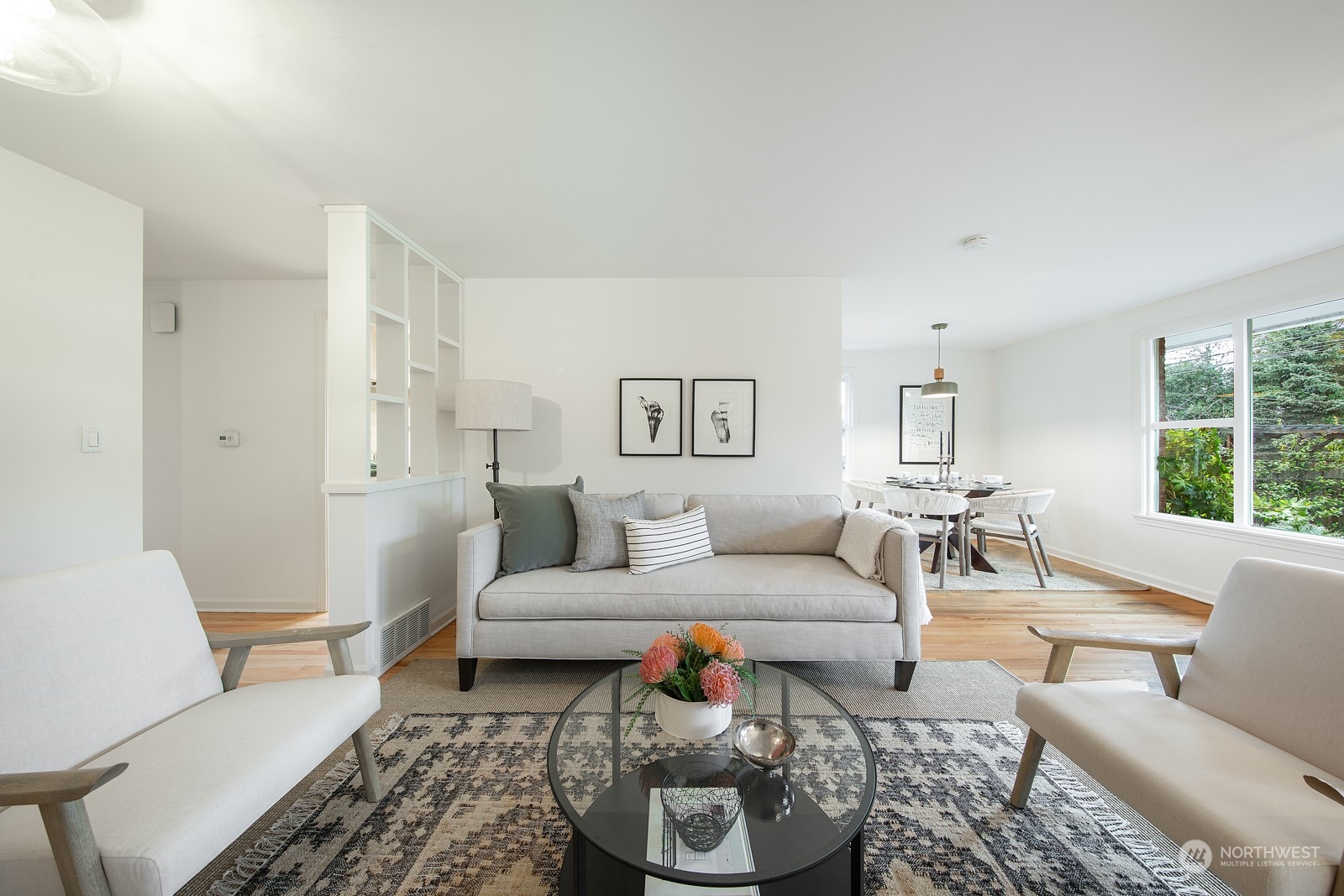 1821 North 80th Street Seattle, WA 98103 - Photo 2 of 30 a living room with furniture and a large window