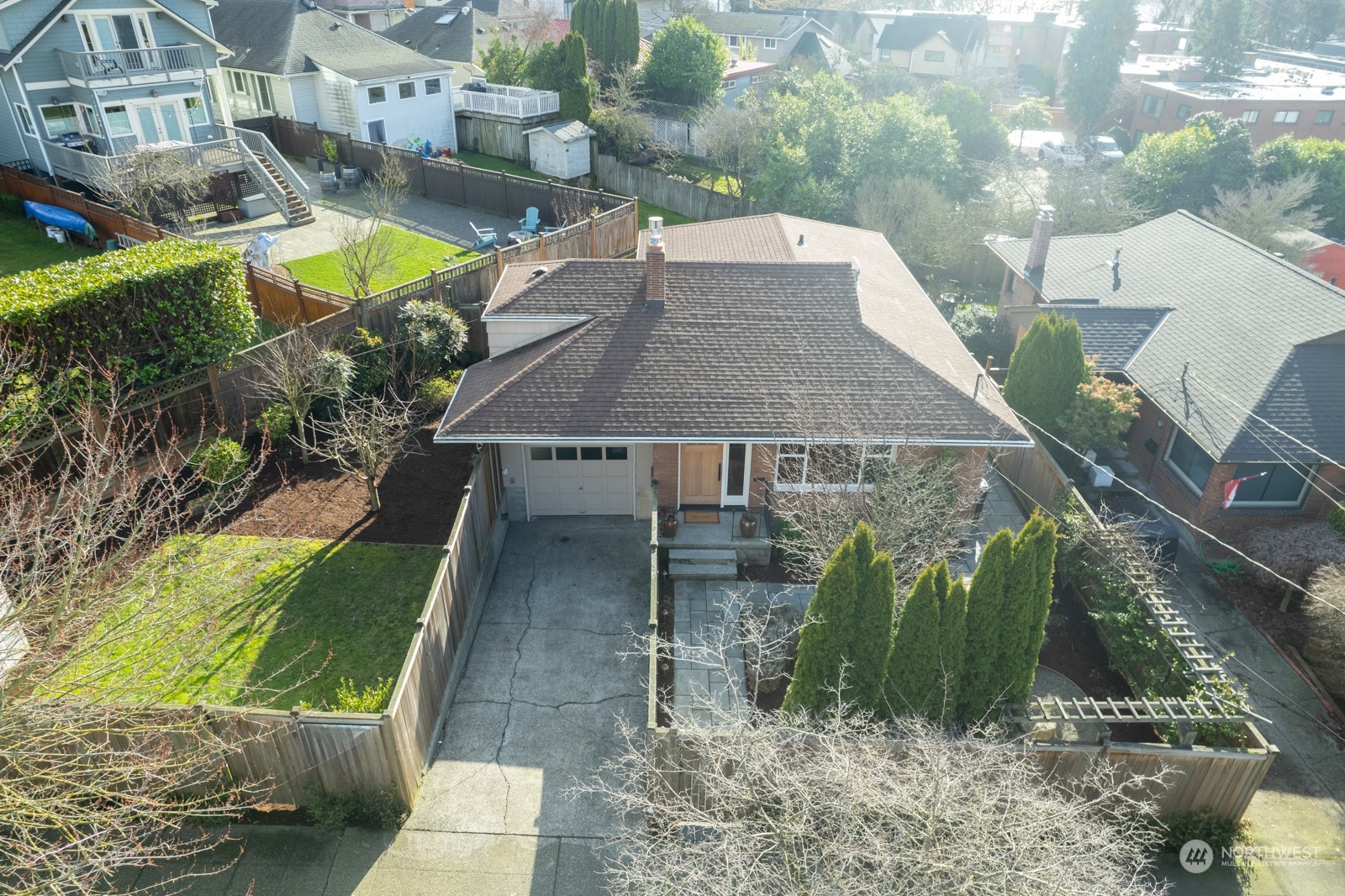 1821 North 80th Street Seattle, WA 98103 - Photo 26 of 30 a view of a house with a yard