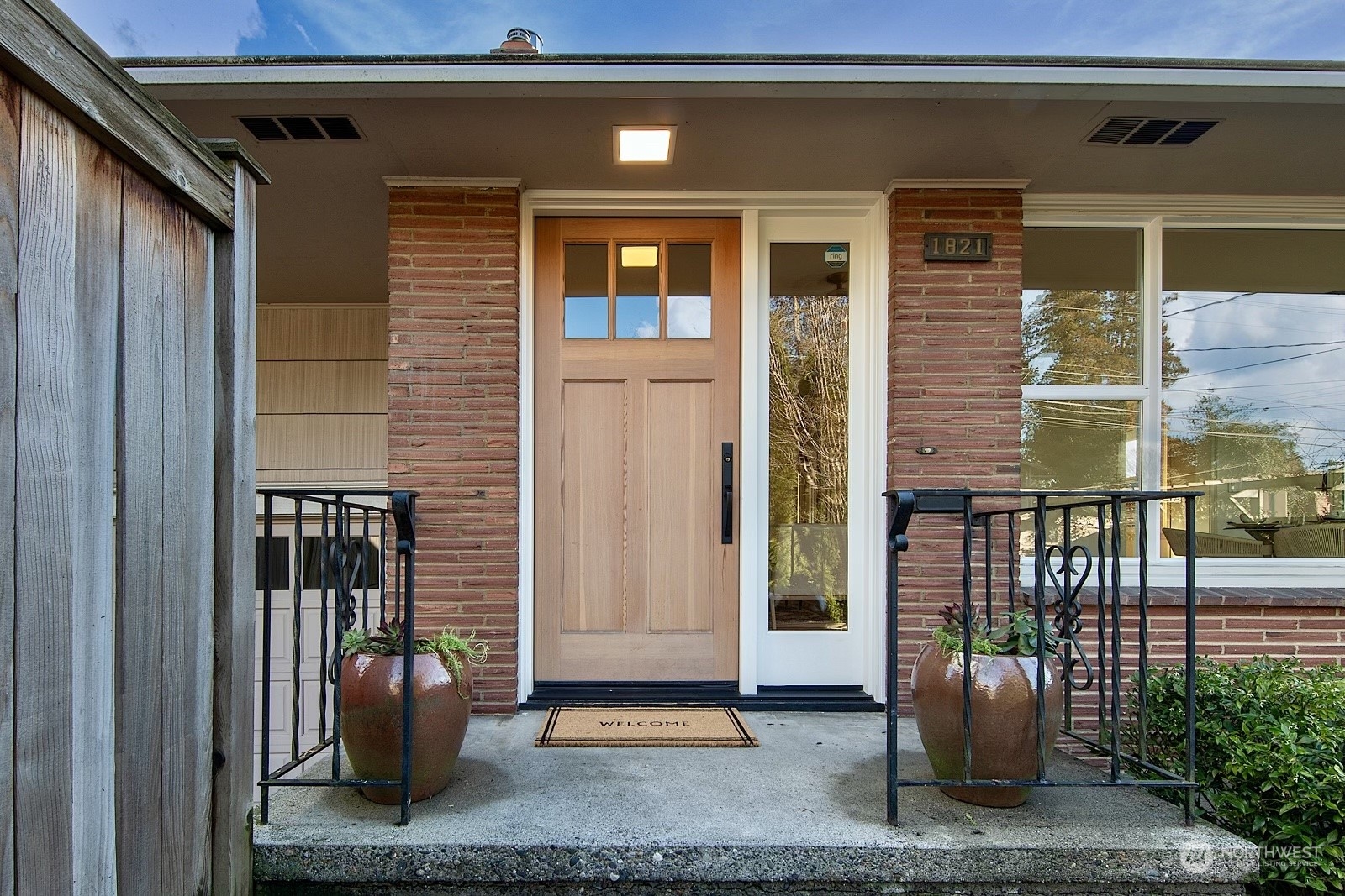 1821 North 80th Street Seattle, WA 98103 - Photo 30 of 30 a front view of a house with a porch