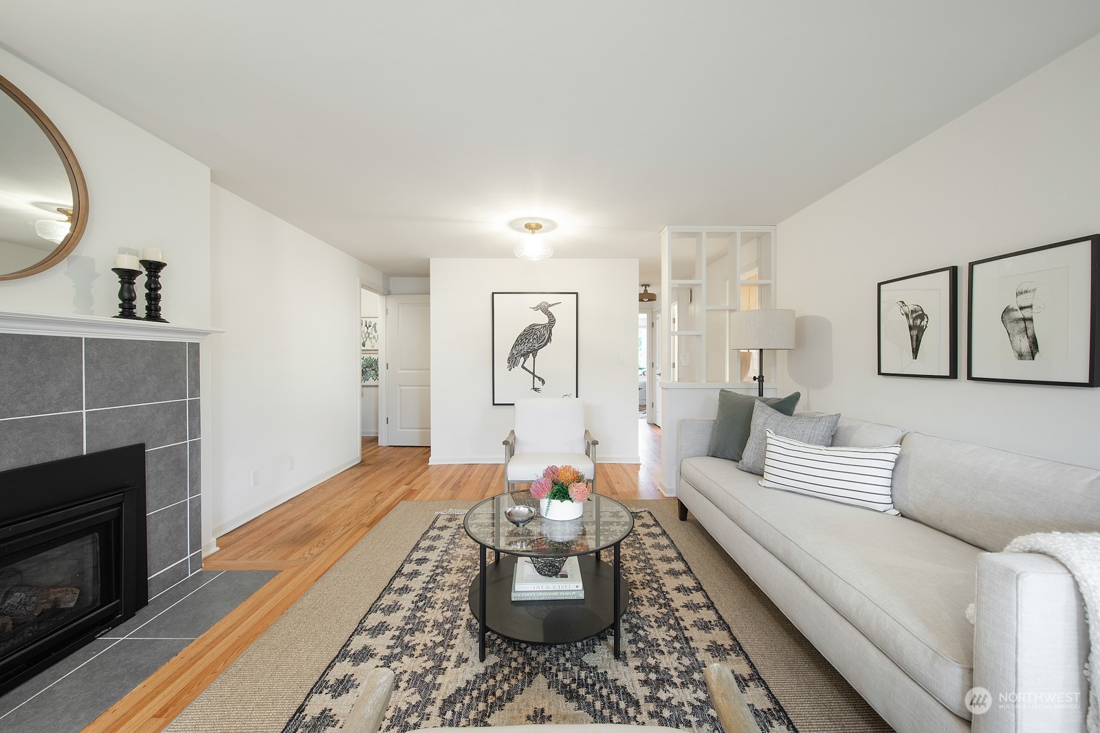 1821 North 80th Street Seattle, WA 98103 - Photo 3 of 30 a living room with furniture and a fireplace