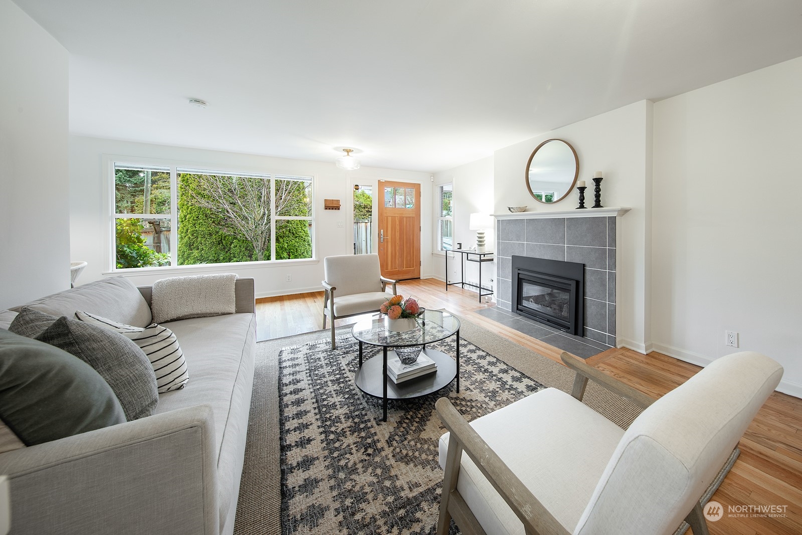 1821 North 80th Street Seattle, WA 98103 - Photo 4 of 30 a living room with furniture and a fireplace