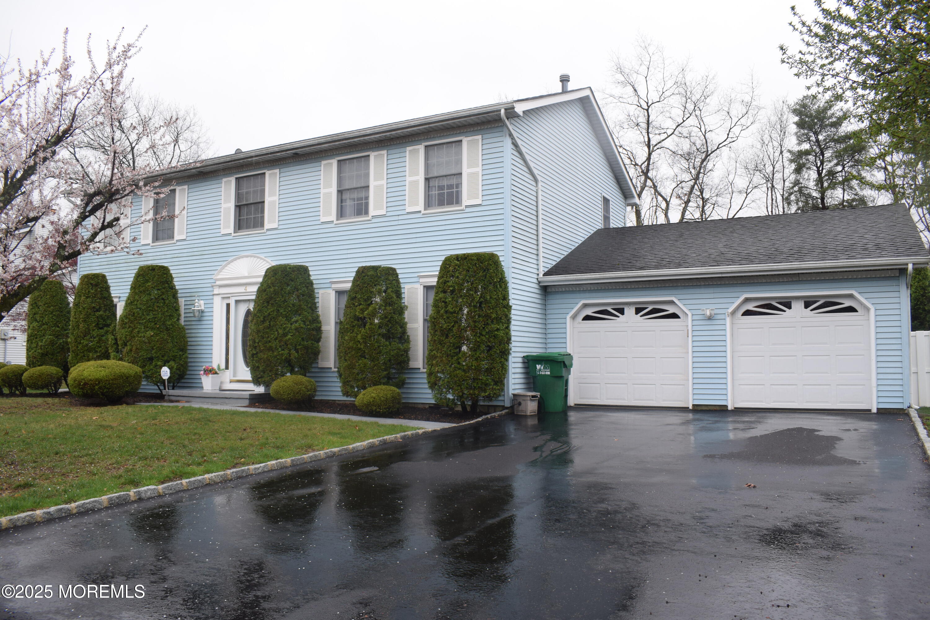 4 Hemlock Hill Road Jackson, NJ 08527 - Photo 1 of 42 a front view of a house with garden