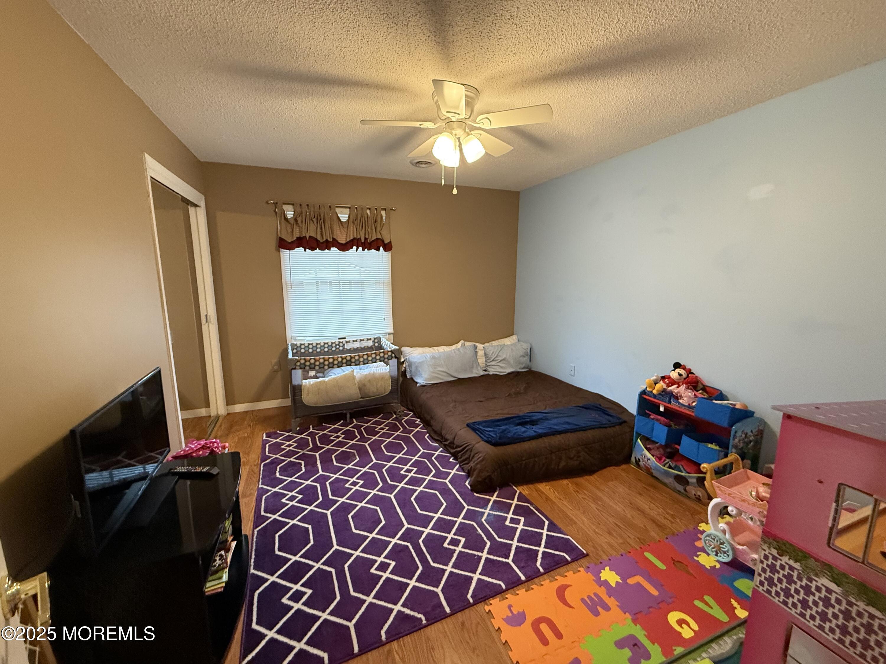 4 Hemlock Hill Road Jackson, NJ 08527 - Photo 19 of 42 a bedroom with a bed and window