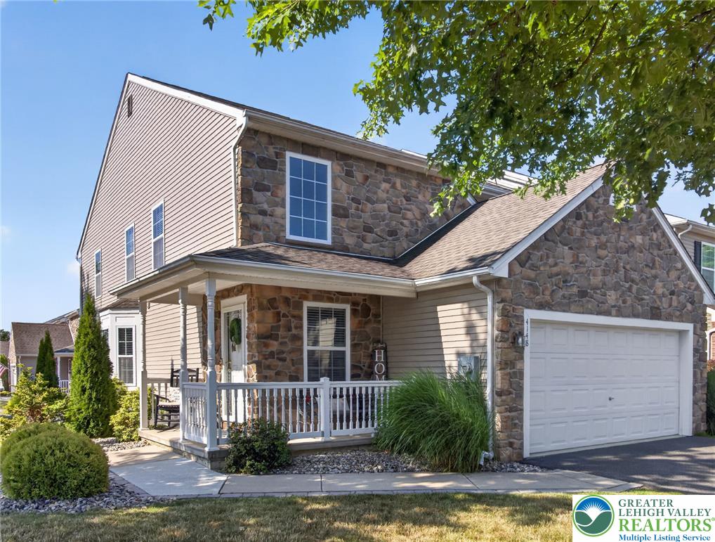 4148 Ross Road Bethlehem, PA 18020 - Photo 1 of 67 A welcoming stone and siding facade offers excellent curb appeal and a covered porch entry.