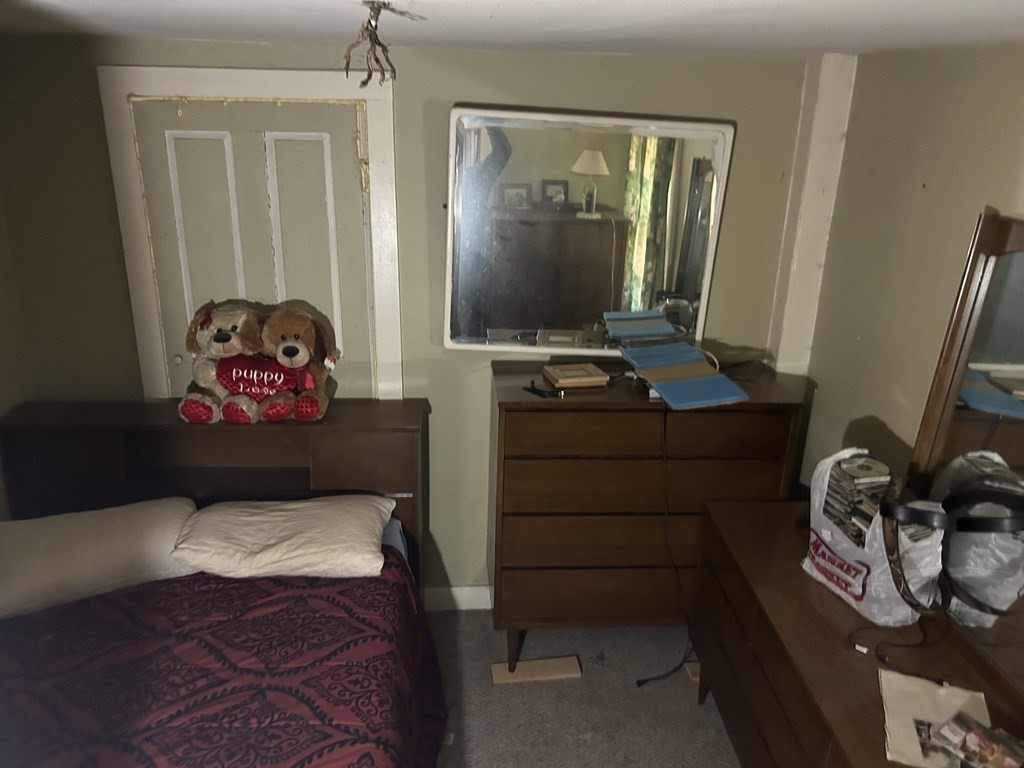 39 Platts Road Ashburnham, MA 01430 - Photo 6 of 17 a bedroom with a bed and a mirror