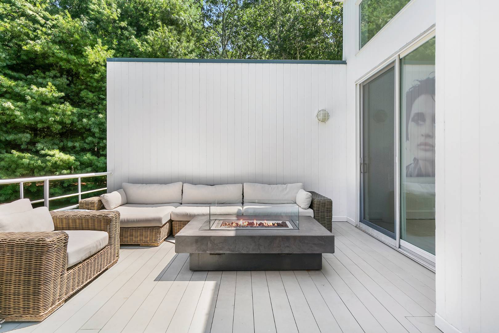 165 2 Holes Water Road East Hampton, NY 11937 - Photo 16 of 19 a view of a couches in a patio with wooden floor