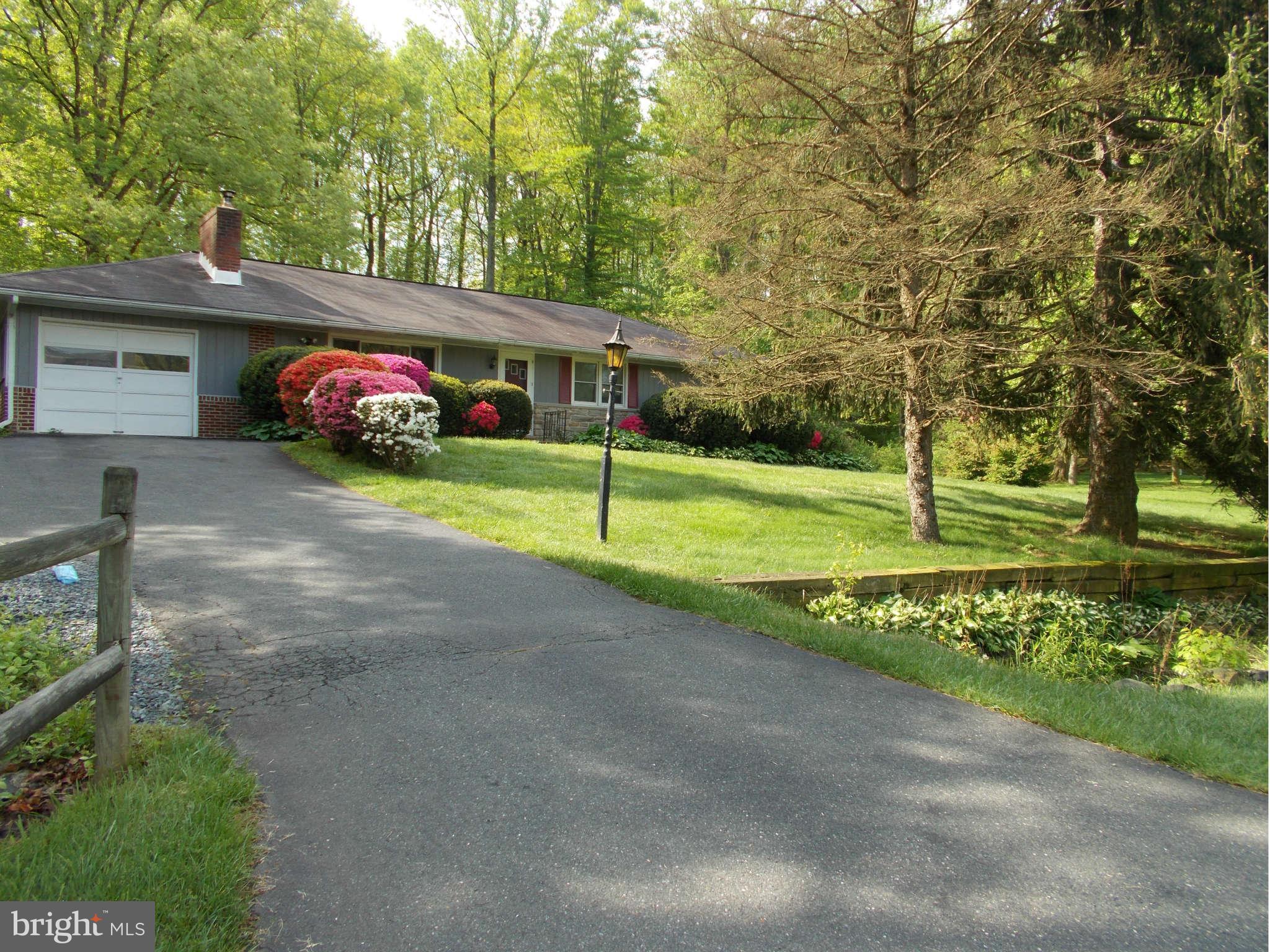 2419 Stoneybrook Road Fallston, MD 21047 - Photo 1 of 30 a front view of a house with a yard
