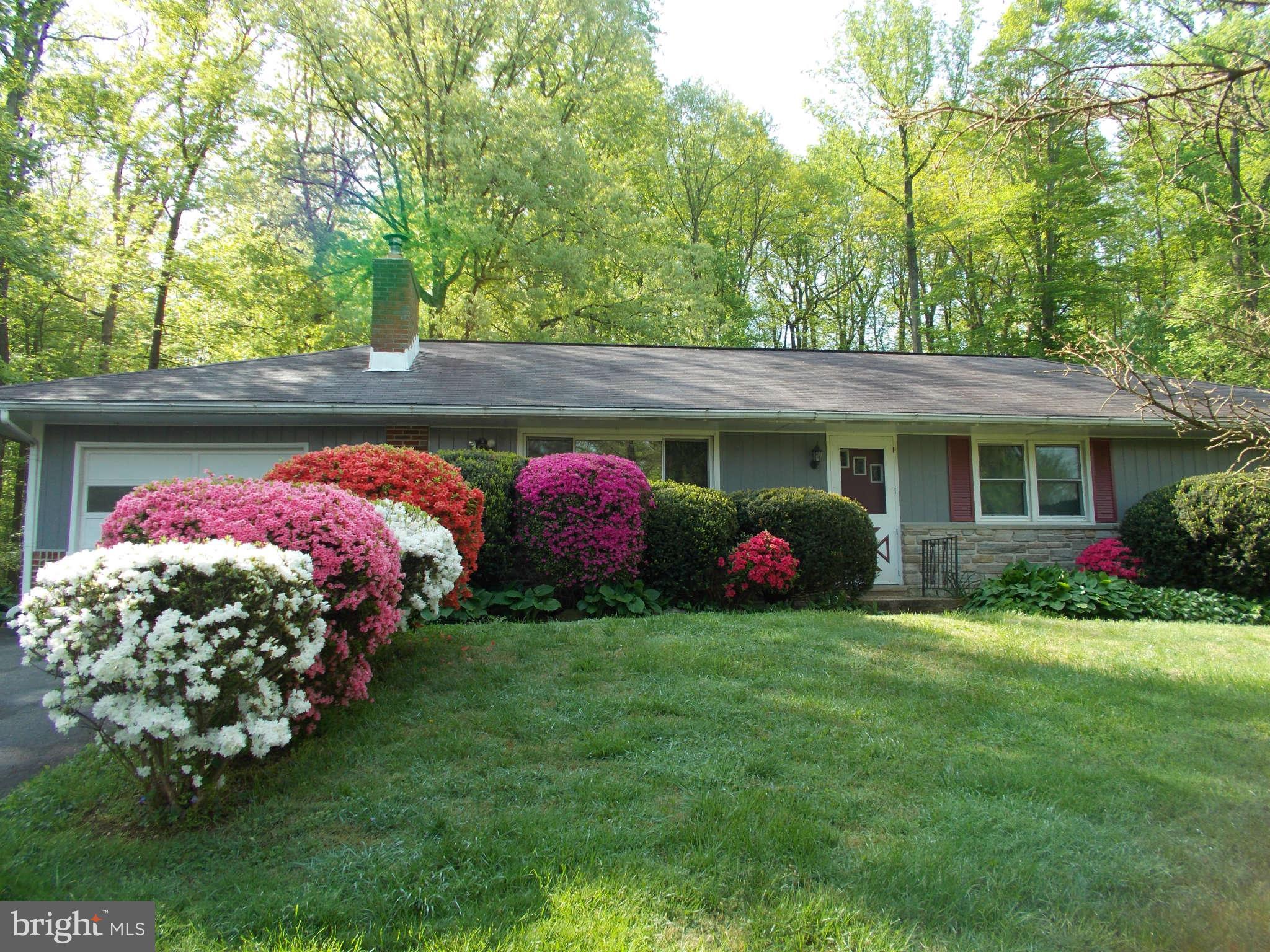 2419 Stoneybrook Road Fallston, MD 21047 - Photo 2 of 30 a front view of a house with garden