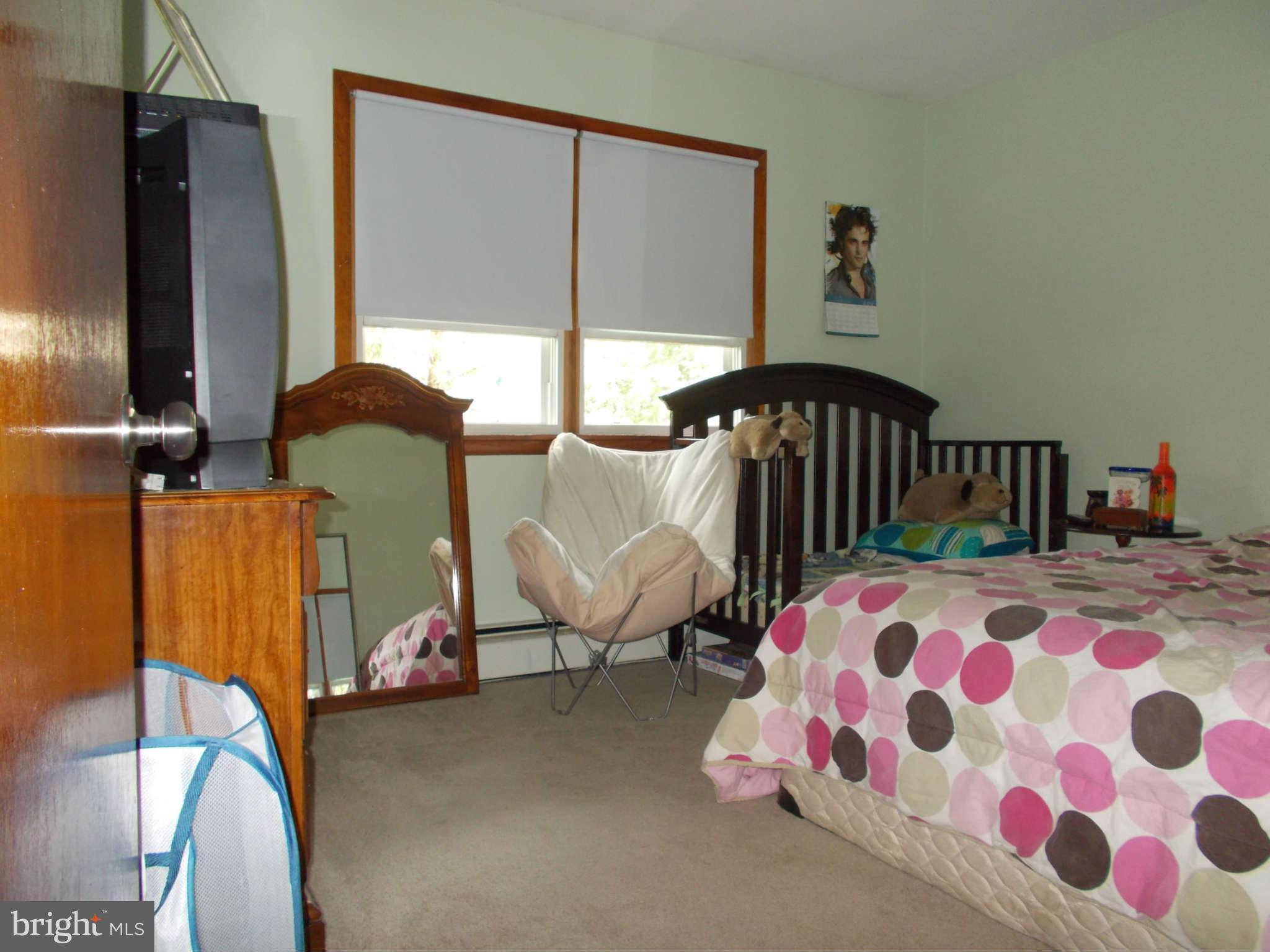 2419 Stoneybrook Road Fallston, MD 21047 - Photo 15 of 30 a bedroom with two beds and large windows