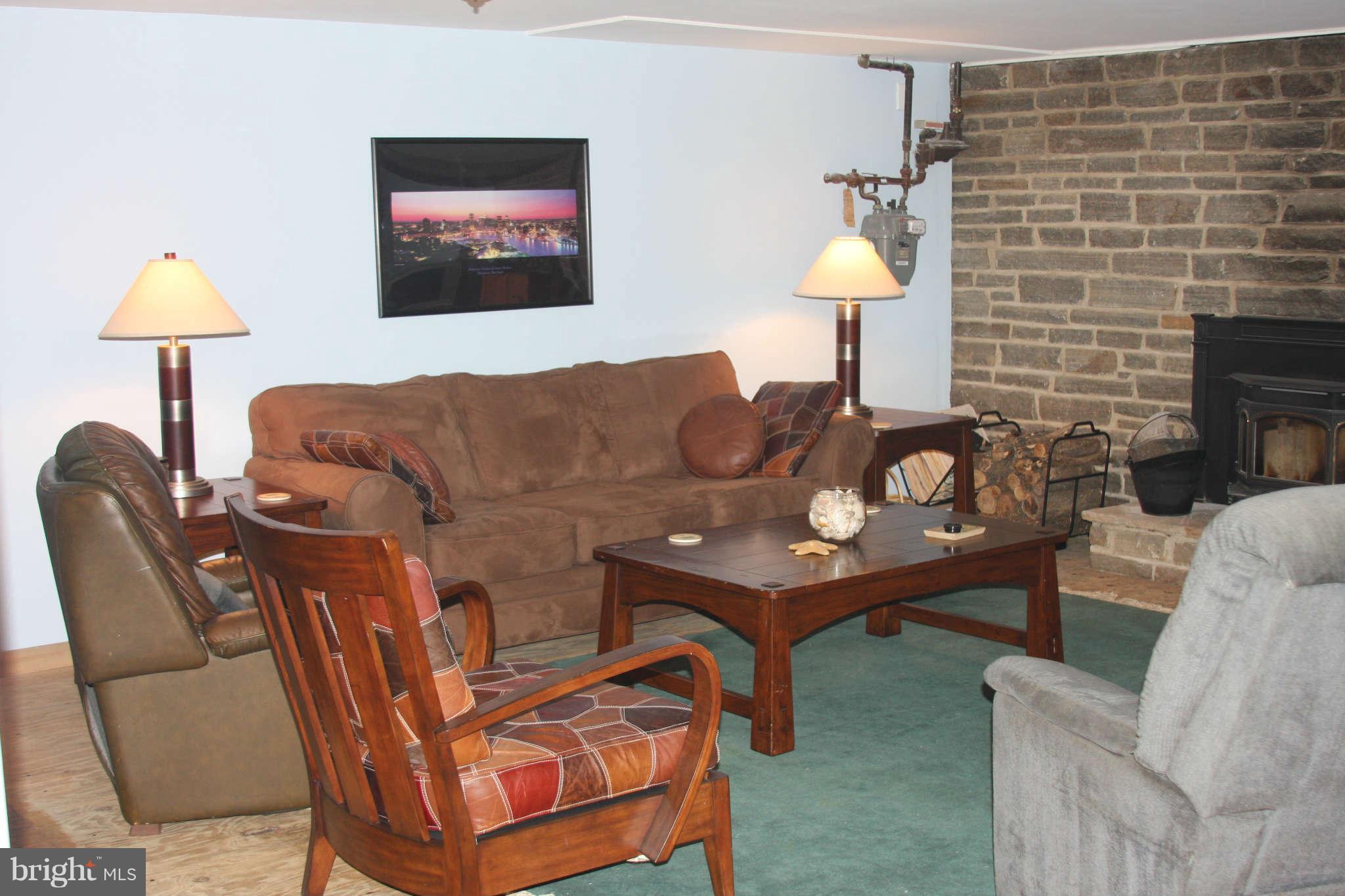 2419 Stoneybrook Road Fallston, MD 21047 - Photo 17 of 30 a living room with furniture and a lamp