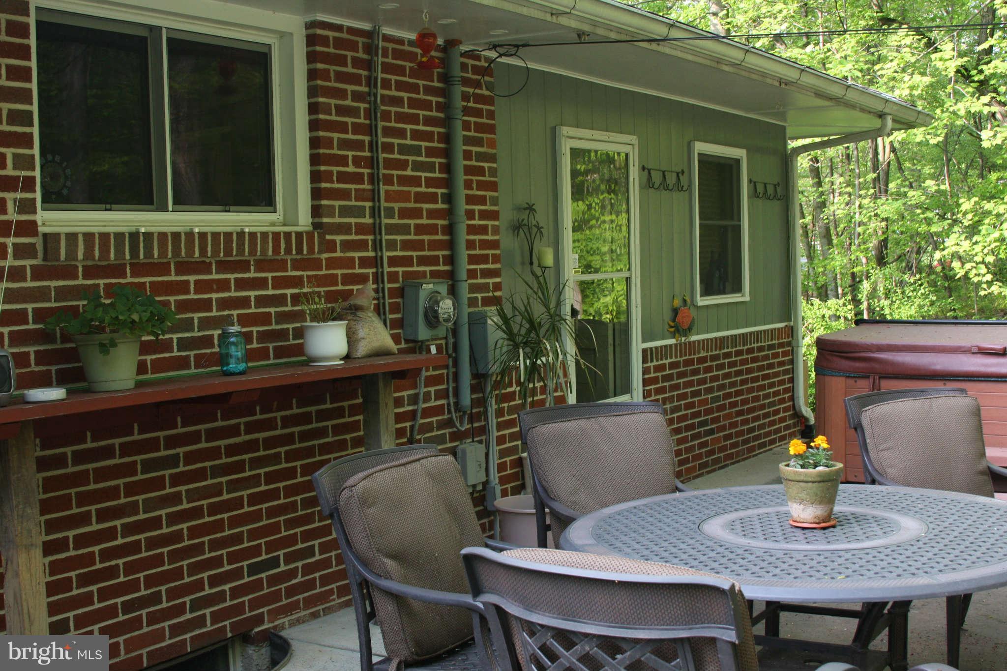 2419 Stoneybrook Road Fallston, MD 21047 - Photo 21 of 30 a view of a house with a backyard and sitting area