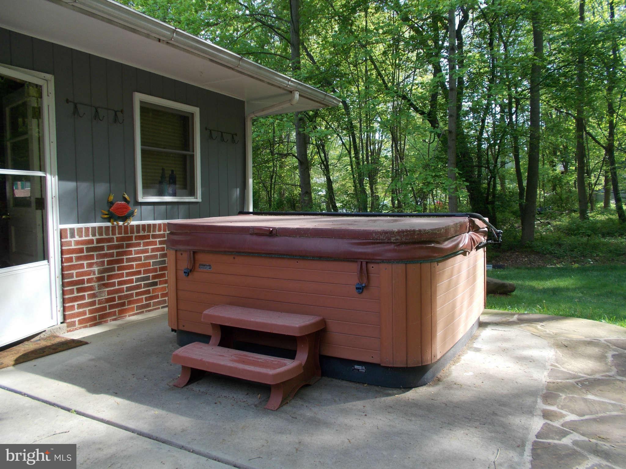2419 Stoneybrook Road Fallston, MD 21047 - Photo 25 of 30 a wooden bench sitting in front of a house