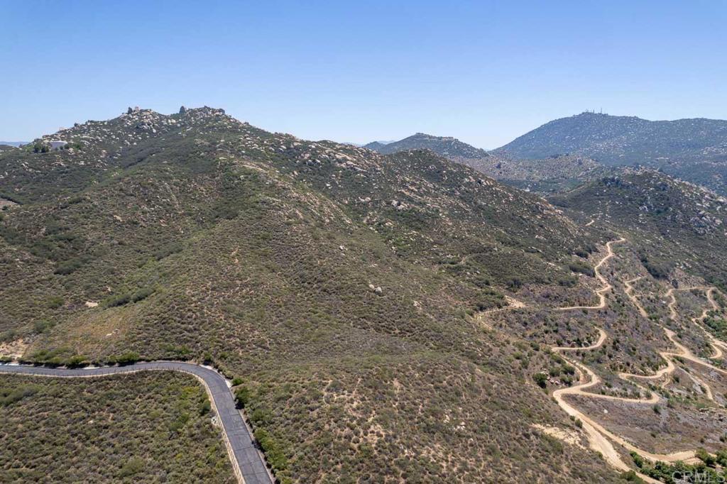 18055 Sunset Point Poway, CA 92064 - Photo 5 of 39 a view of a mountain in the distance in a field