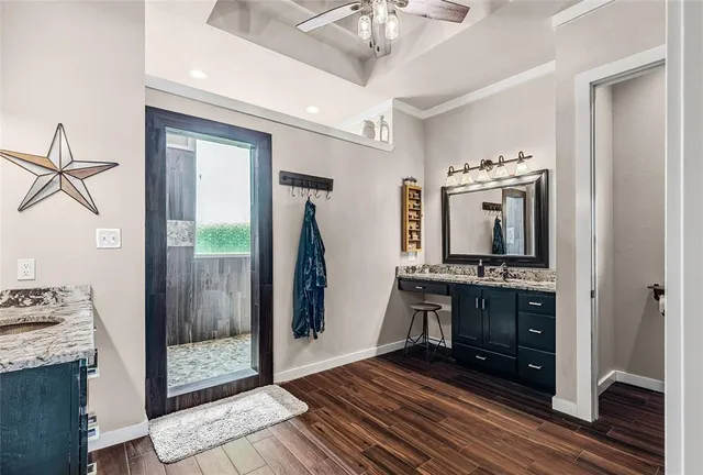 a kitchen with stainless steel appliances granite countertop a stove and a refrigerator