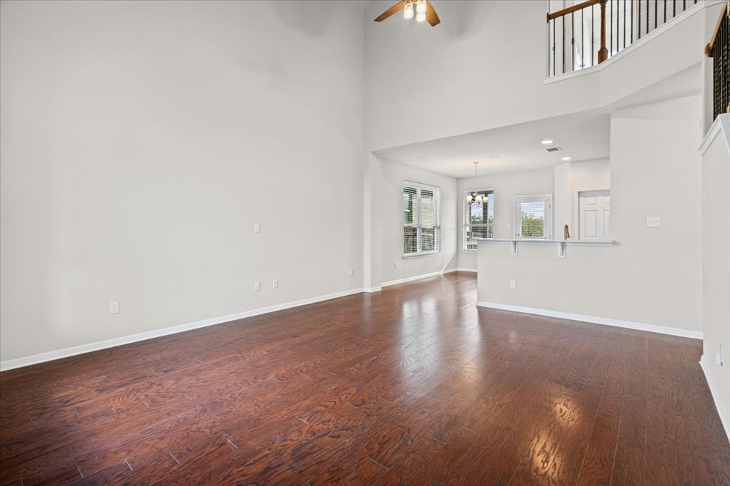 1012 Goldilocks Lane Manchaca, TX 78652 - Photo 10 of 38 Large living room with high ceilings, hard wood floors, and lots of light!