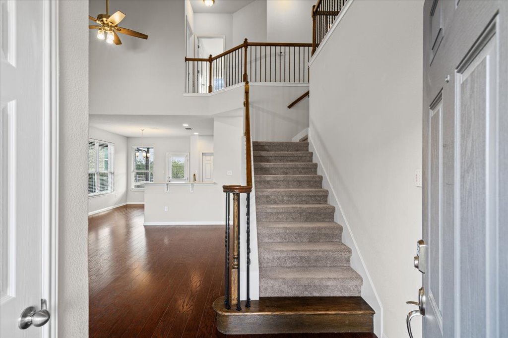 1012 Goldilocks Lane Manchaca, TX 78652 - Photo 38 of 38 Grand entrance with high ceilings, hardwood flooring, and open floor plan.