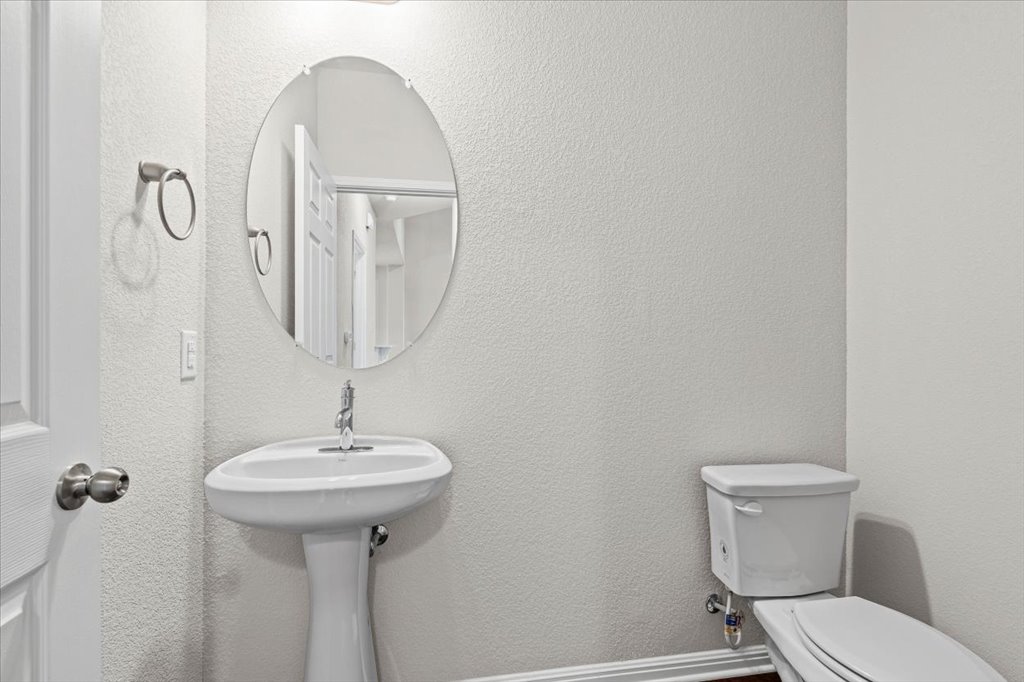 1012 Goldilocks Lane Manchaca, TX 78652 - Photo 16 of 38 Half bath downstairs.