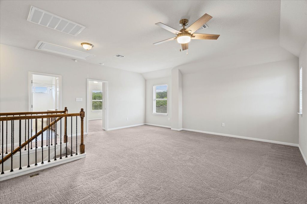 1012 Goldilocks Lane Manchaca, TX 78652 - Photo 22 of 38 Loft leads to secondary bedrooms and bathroom.