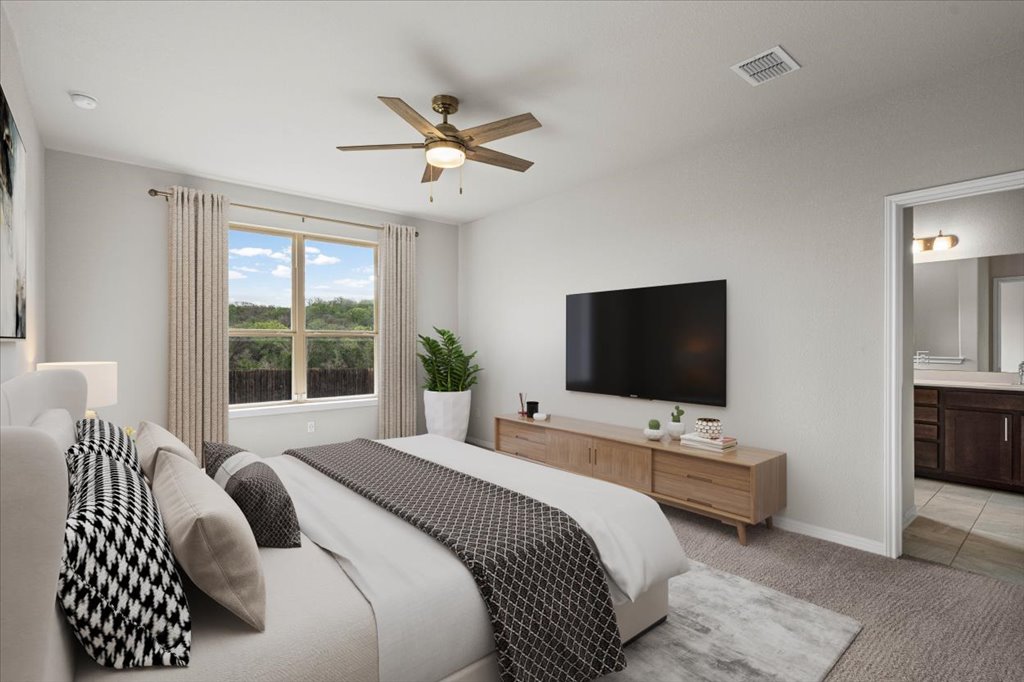 1012 Goldilocks Lane Manchaca, TX 78652 - Photo 4 of 38 Virtually staged primary bedroom.