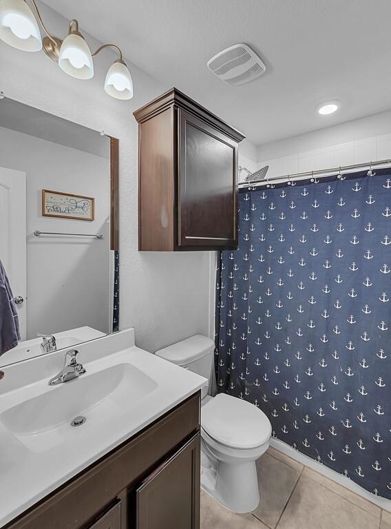 11108 Beckon Falls Waco, TX 76708 - Photo 24 of 32 a bathroom with a sink toilet and shower