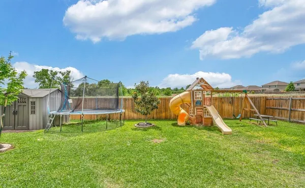a view of a house with a park