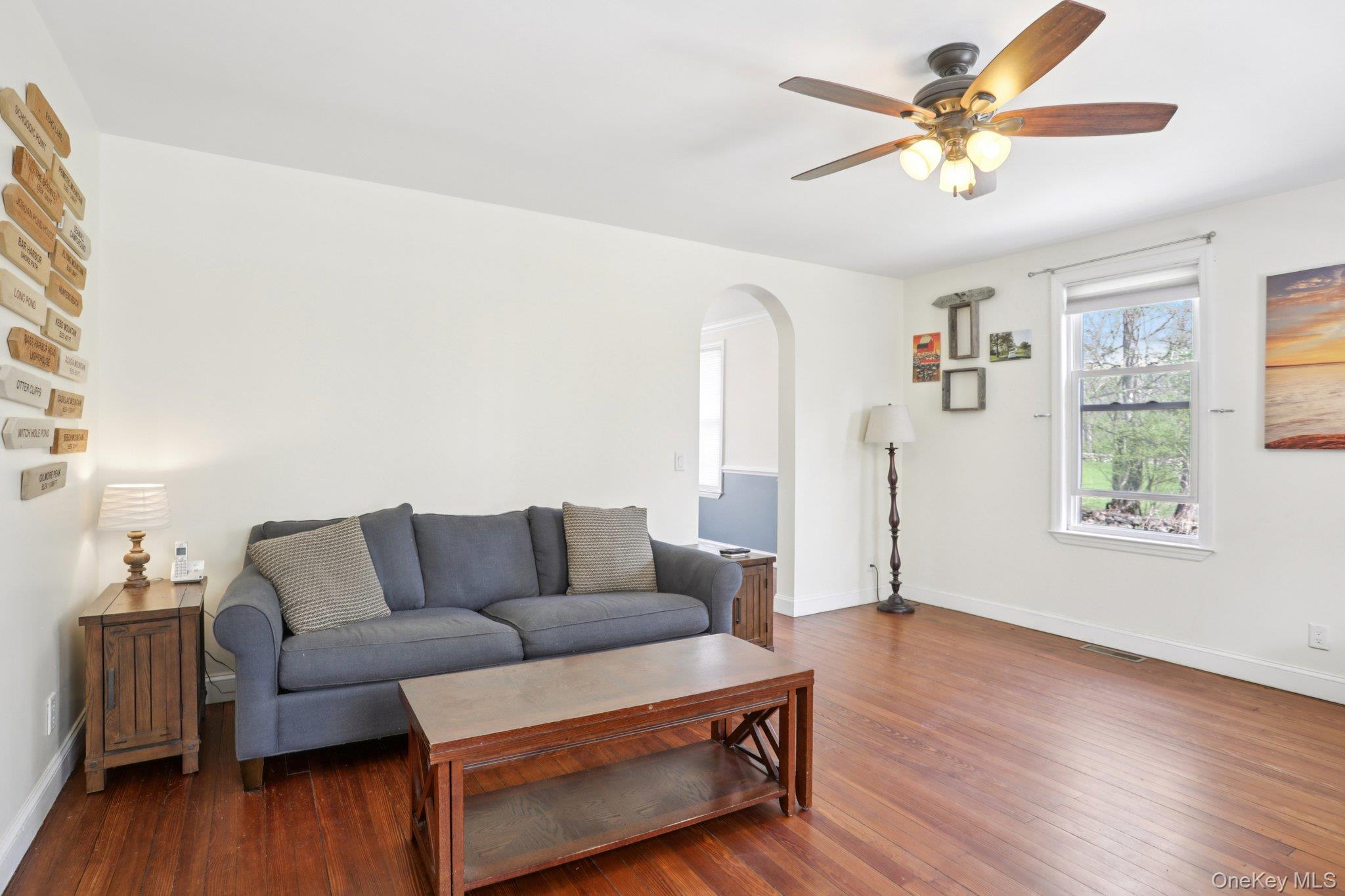 101 Spring Valley Road Ossining, NY 10562 - Photo 12 of 39 a living room with furniture and a large window