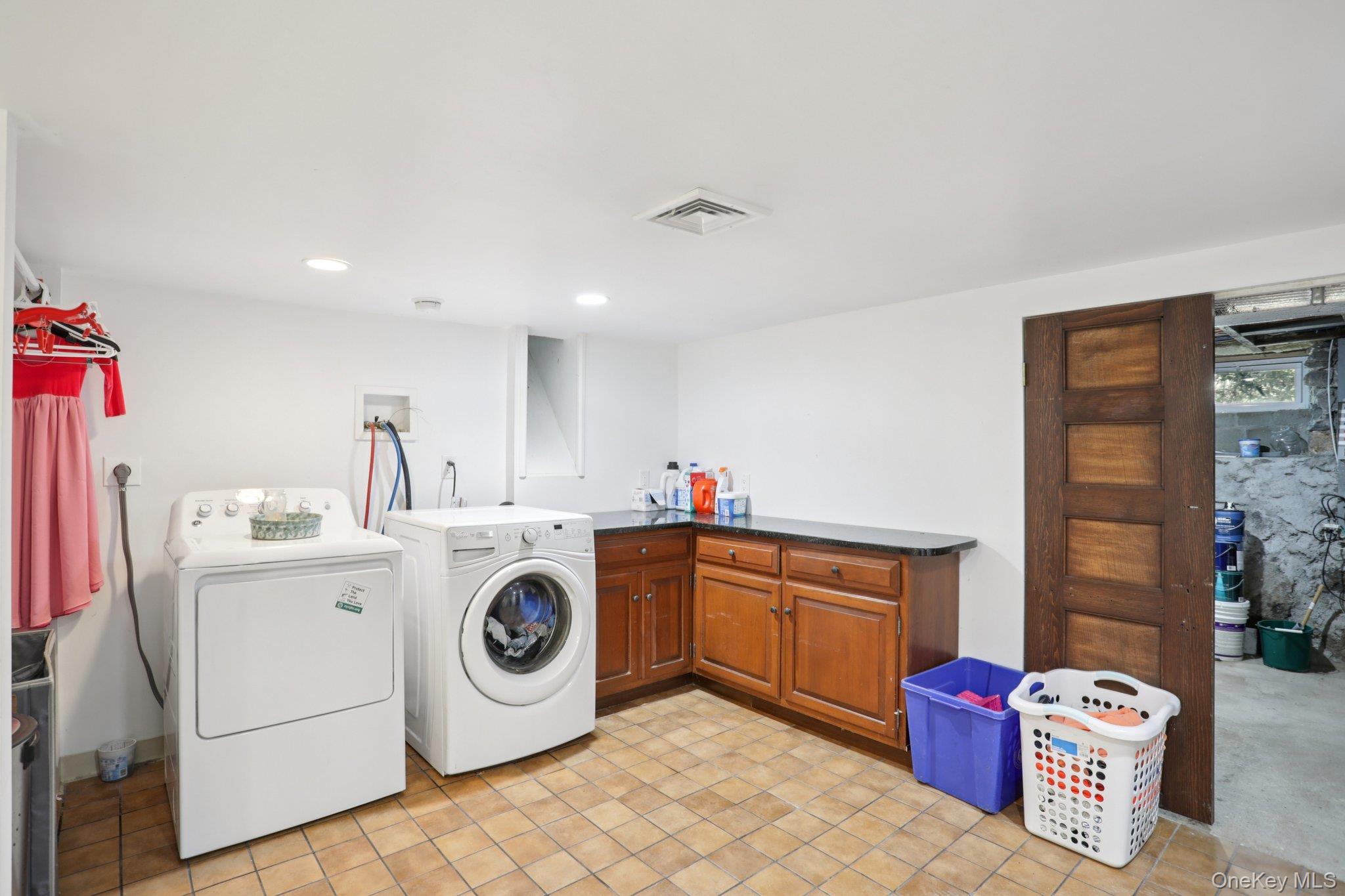 101 Spring Valley Road Ossining, NY 10562 - Photo 21 of 39 a utility room with sink dryer and washer